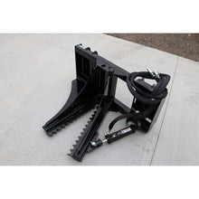Top Dog Attachments low profile tree puller on the shop floor with its hoses