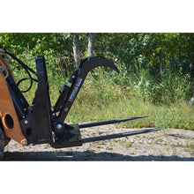 Top Dog Attachments pallet fork grapple bolted to skid steer pallet forks, side view
