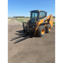 Top Dog Attachments pallet forks on a Case skid steer