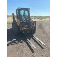 Top Dog Attachments pallet forks on a compact track loader