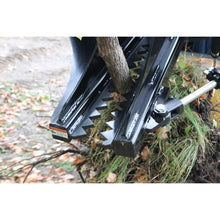 Top Dog Attachments tree puller gripping a small tree at the base