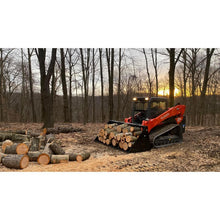 Top Dog Attachments XL firewood bucket full of logs on a compact track loader in the woods